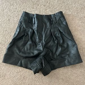 TOPSHOP faux leather shorts.